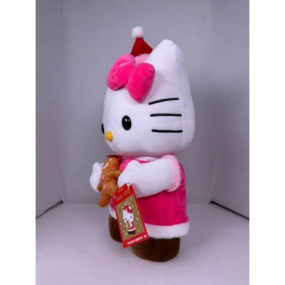 NWT -‎ Hello Kitty holding Gingerbread Cookie Christmas Greeter-CVS 2025